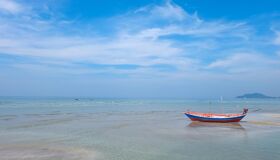 Lonely Boat on the Beach in the South of Thailand